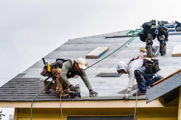 Professional Storm Damage Roof Repair technician working in Yaphank, NY